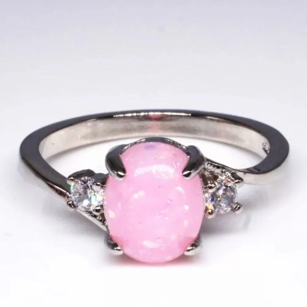 BRAND NEW.925SS OVAL CUT PINK OPAL RING